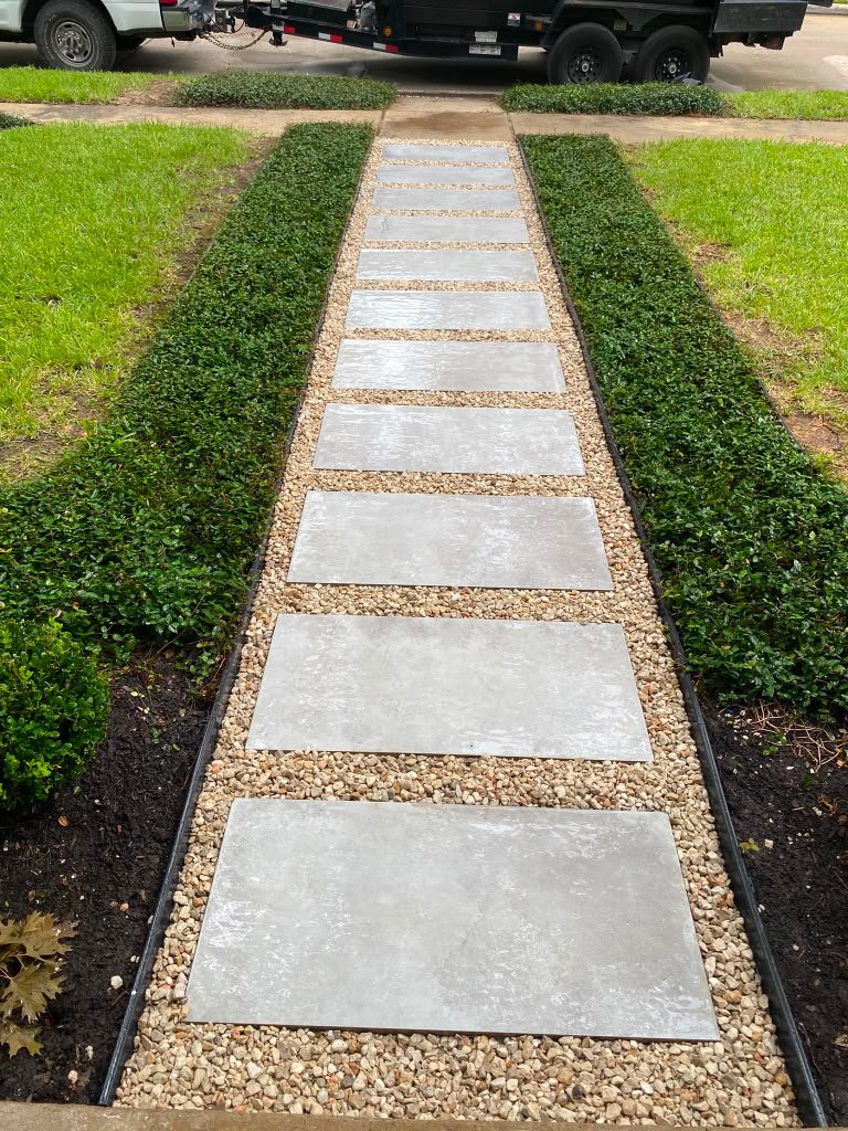 Defined walkway added to a residential landscape